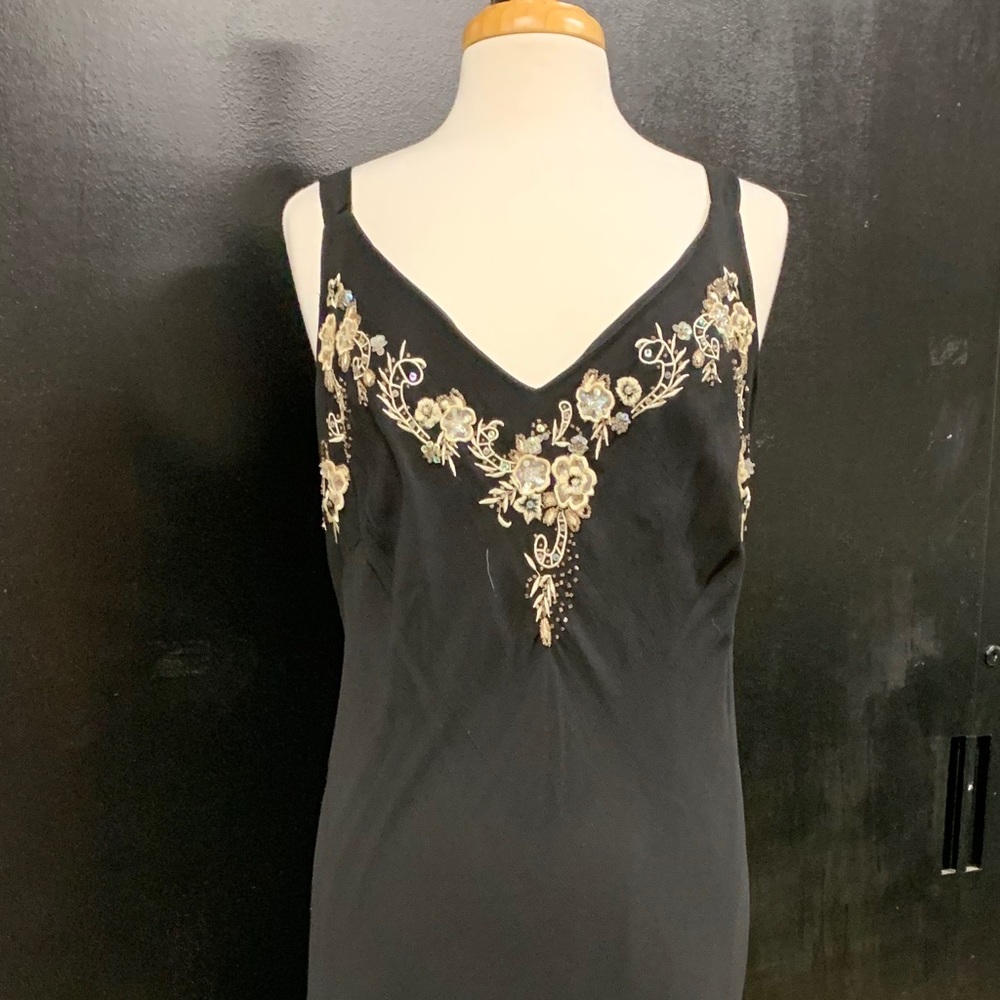 Black spaghetti strap dress with gold embroidery